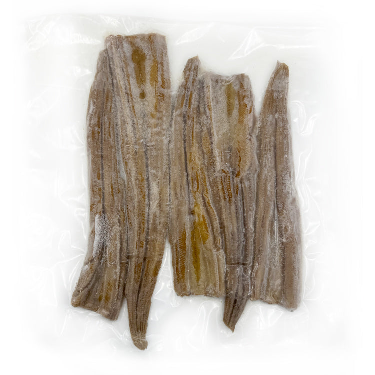 Vacuum-sealed packaging containing several cooked and seasoned eel fillets. The eels are visible through the clear plastic, showcasing their uniform size and the moist, slightly translucent texture of the flesh, suggesting they are ready to be heated and served