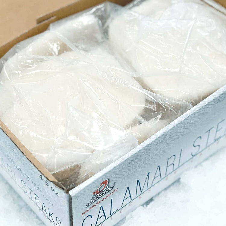 Bulk Pack of Calamari Steaks in Open Box - High-Quality Frozen Seafood for Wholesale and Retail