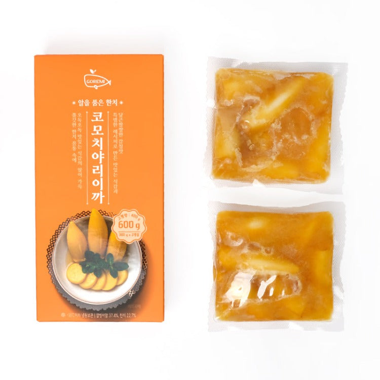 Front view of Goremi Komochi Yari-Ika packaging alongside two vacuum-sealed packs of cooked squid with herring roe