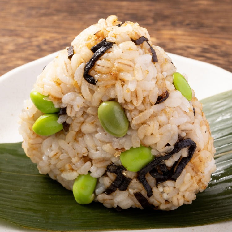 Kombu Rice Ball with Edamame on a White Plate