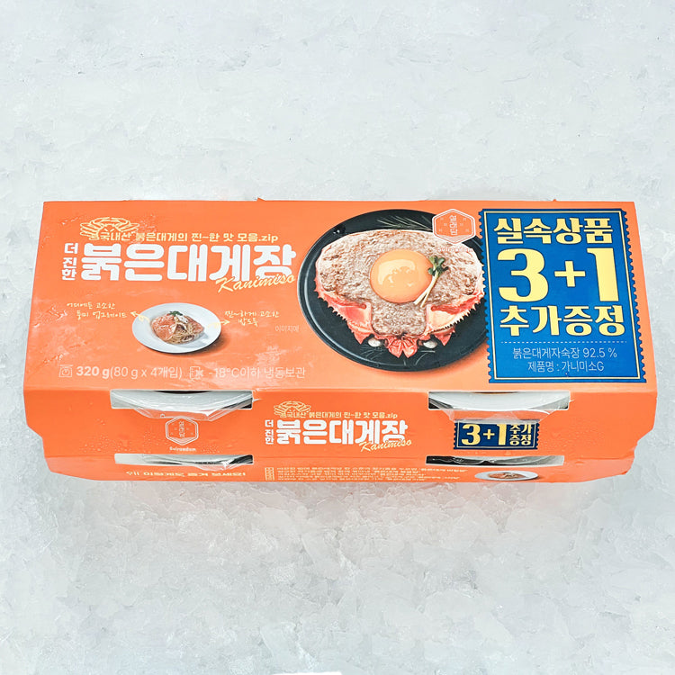 Front packaging of Red Snow Crab Meat Sauce (Kanimiso) showing the product box with an image of a prepared dish featuring crab meat sauce and an egg yolk